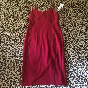 Red dress with black stitching